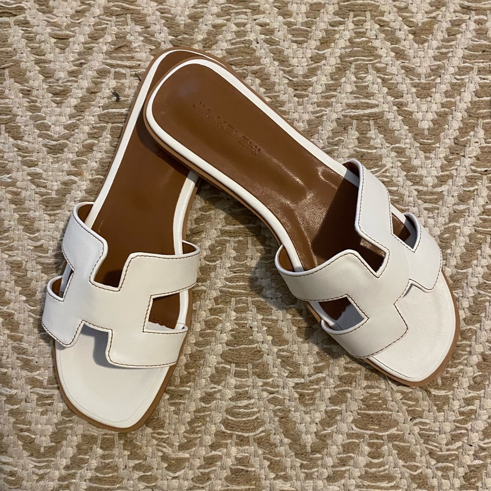 White cut out leather slide sandals